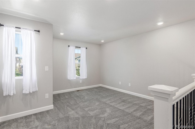 3338 Ireland Moss St, Castle Rock, CO 80109 - carpeted empty room with baseboards and recessed lighting