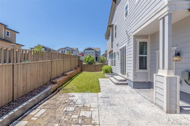 3338 Ireland Moss St, Castle Rock, CO 80109 - fenced backyard featuring a patio area and a residential view