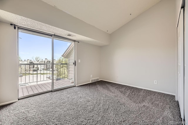 4899 S Dudley St Unit 20G, Littleton, CO 80123 - unfurnished room featuring carpet floors, baseboards, and lofted ceiling