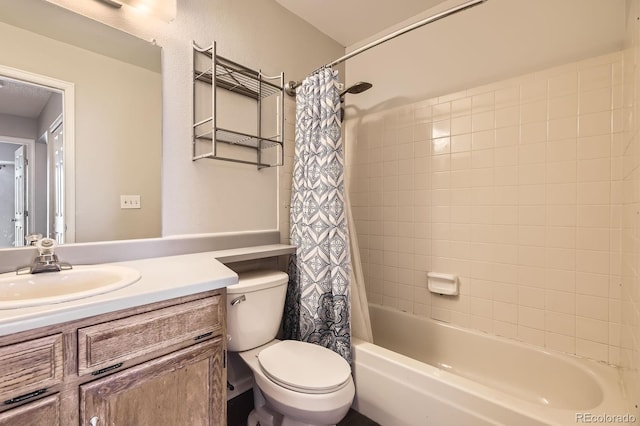 4899 S Dudley St Unit 20G, Littleton, CO 80123 - bathroom featuring toilet, vanity, and shower / bath combination with curtain