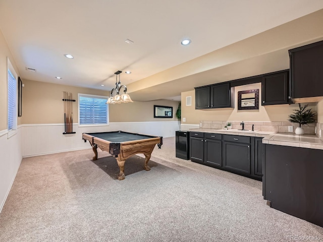 recreation room with light colored carpet, a sink, a wainscoted wall, recessed lighting, and billiards