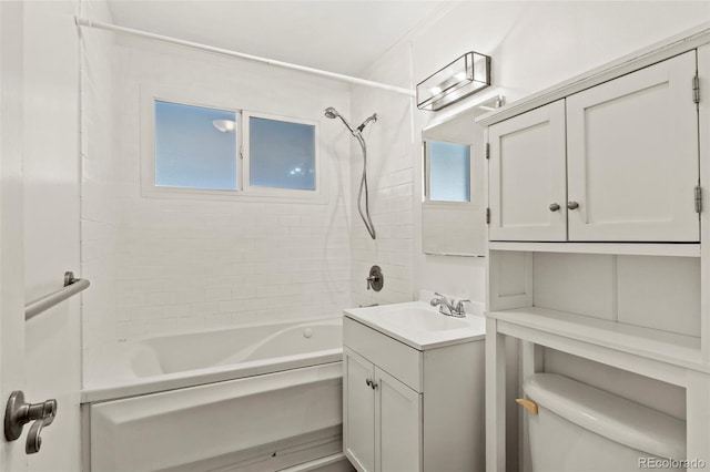 2613 Wren Dr, Colorado Springs, CO 80909 - bathroom with toilet, vanity, and washtub / shower combination