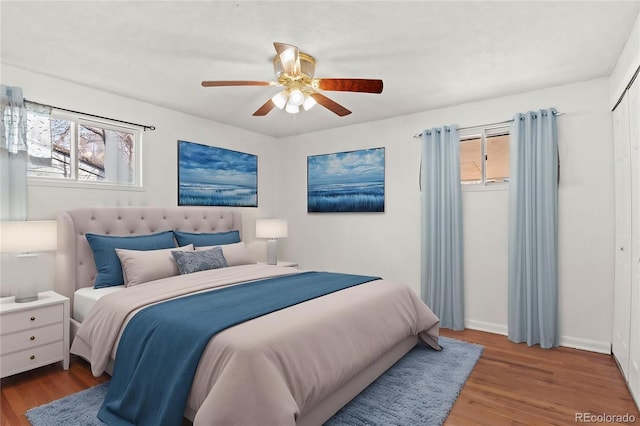 2613 Wren Dr, Colorado Springs, CO 80909 - bedroom featuring wood finished floors, baseboards, and a ceiling fan