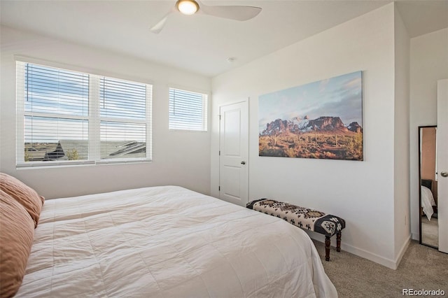 bedroom featuring light carpet and ceiling fan