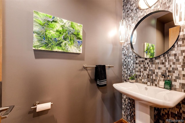32651 Buffalo Creek Rd, Evergreen, CO 80439 - bathroom featuring tile walls and decorative backsplash
