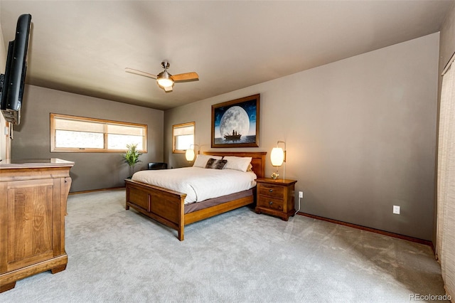 32651 Buffalo Creek Rd, Evergreen, CO 80439 - bedroom with light carpet, ceiling fan, and baseboards