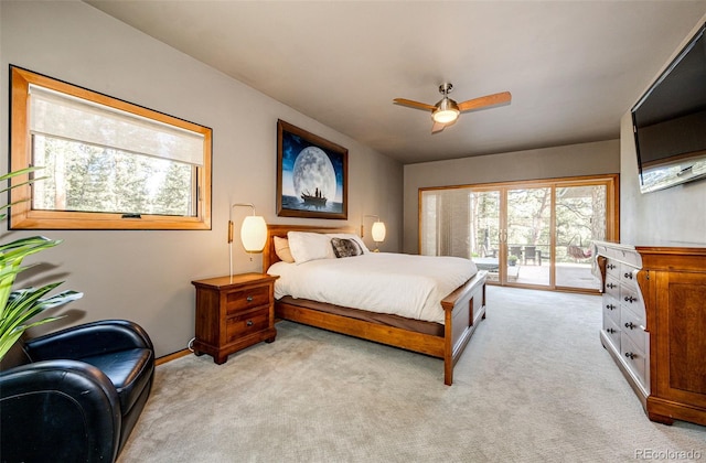 32651 Buffalo Creek Rd, Evergreen, CO 80439 - bedroom featuring access to exterior, light carpet, ceiling fan, and baseboards