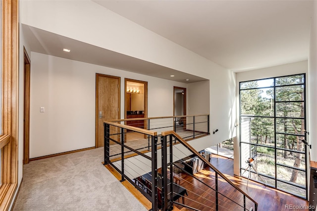 32651 Buffalo Creek Rd, Evergreen, CO 80439 - hall with an upstairs landing and baseboards
