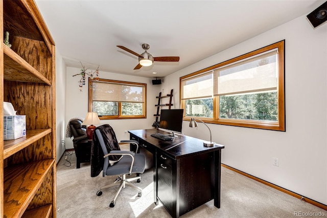 32651 Buffalo Creek Rd, Evergreen, CO 80439 - home office featuring light carpet, ceiling fan, and baseboards