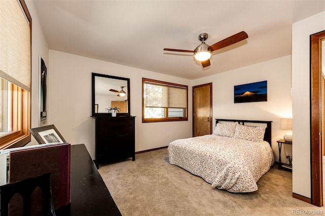 32651 Buffalo Creek Rd, Evergreen, CO 80439 - carpeted bedroom featuring baseboards and a ceiling fan