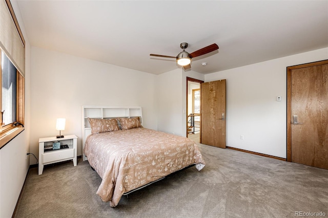 32651 Buffalo Creek Rd, Evergreen, CO 80439 - bedroom with carpet flooring, a ceiling fan, and baseboards