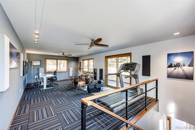 32651 Buffalo Creek Rd, Evergreen, CO 80439 - workout room with carpet, baseboards, and ceiling fan