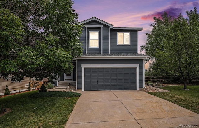 9633 Marmot Ridge Cir, Littleton, CO 80125 - traditional-style home with a garage and concrete driveway
