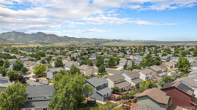 9633 Marmot Ridge Cir, Littleton, CO 80125 - aerial view of residential area with mountains
