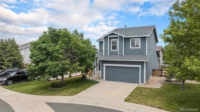 9633 Marmot Ridge Cir, Littleton, CO 80125 - traditional-style house with roof with shingles, an attached garage, and concrete driveway