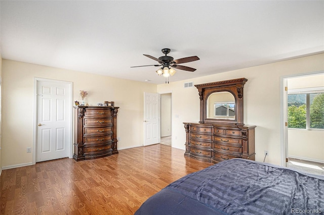 9633 Marmot Ridge Cir, Littleton, CO 80125 - bedroom featuring wood finished floors and ceiling fan