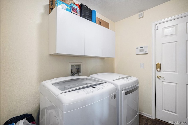 9633 Marmot Ridge Cir, Littleton, CO 80125 - laundry room featuring cabinet space and washing machine and clothes dryer