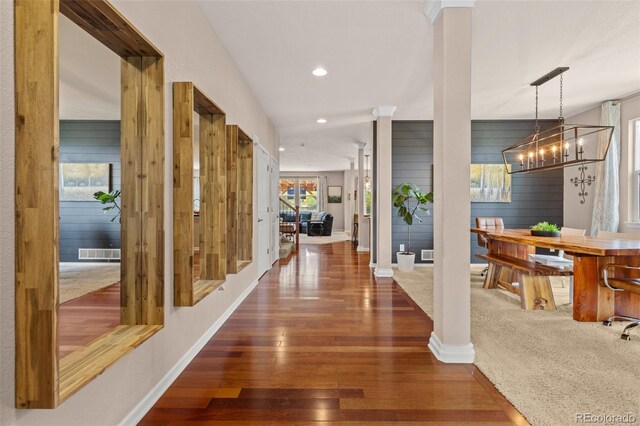 24702 E Ontario Dr, Aurora, CO 80016 - hallway featuring decorative columns, hardwood / wood-style flooring, recessed lighting, a chandelier, and baseboards