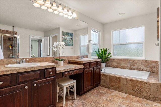 24702 E Ontario Dr, Aurora, CO 80016 - full bath featuring vanity, a shower stall, and a bath