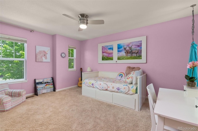 24702 E Ontario Dr, Aurora, CO 80016 - carpeted bedroom with ceiling fan and baseboards