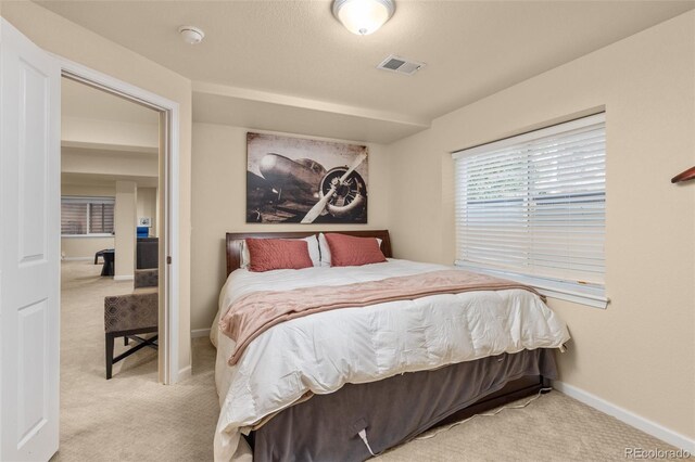 24702 E Ontario Dr, Aurora, CO 80016 - carpeted bedroom with baseboards