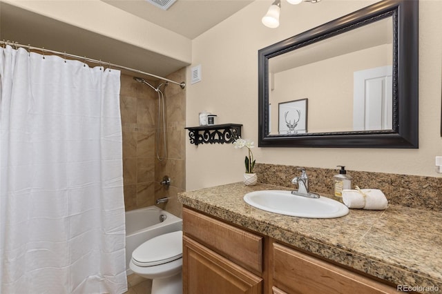 24702 E Ontario Dr, Aurora, CO 80016 - bathroom featuring vanity, shower / bath combo with shower curtain, and toilet