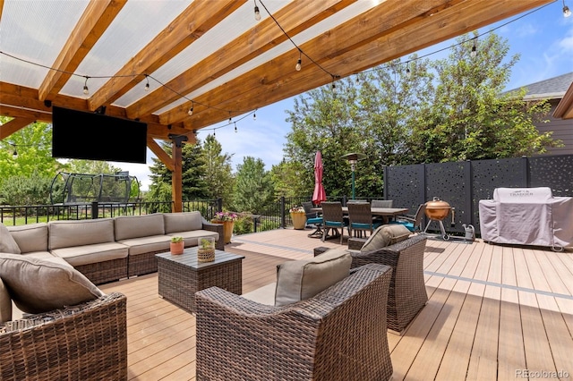 24702 E Ontario Dr, Aurora, CO 80016 - wooden deck with outdoor lounge area, outdoor dining area, and a grill