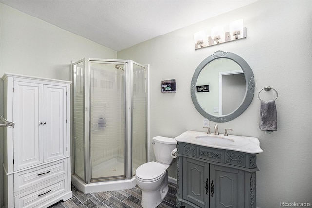 72 Rudi Ln W, Golden, CO 80403 - full bathroom featuring a stall shower, vanity, and wood finished floors