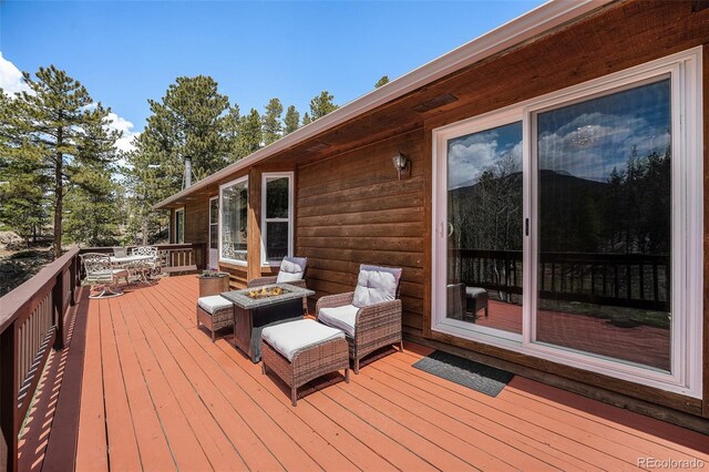 72 Rudi Ln W, Golden, CO 80403 - deck featuring a fire pit and outdoor dining area