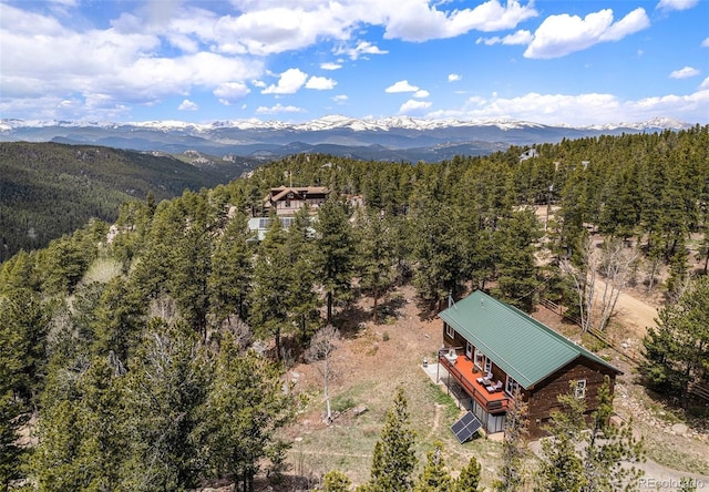 72 Rudi Ln W, Golden, CO 80403 - view of subject property with a forest and a mountain backdrop