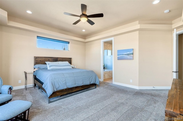 bedroom with ensuite bath, recessed lighting, baseboards, and carpet