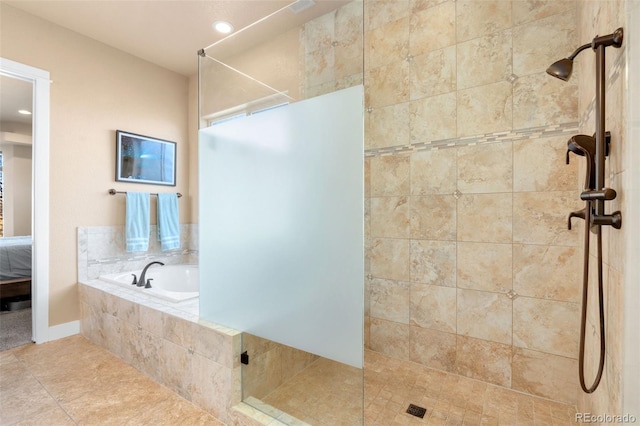 full bathroom featuring tile patterned floors, connected bathroom, a bath, and a walk in shower