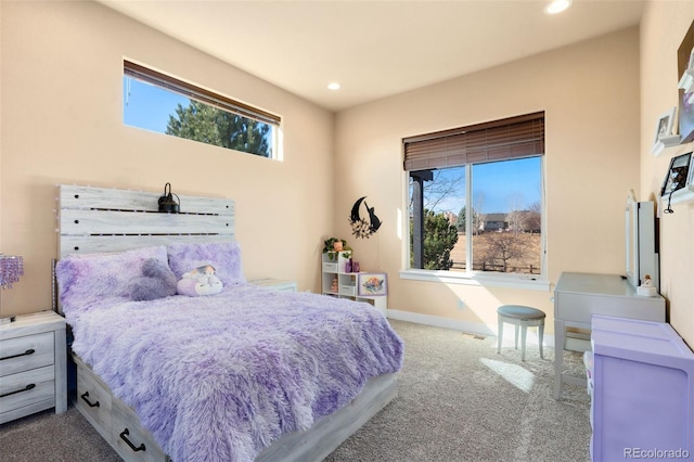 bedroom with recessed lighting, baseboards, and carpet floors