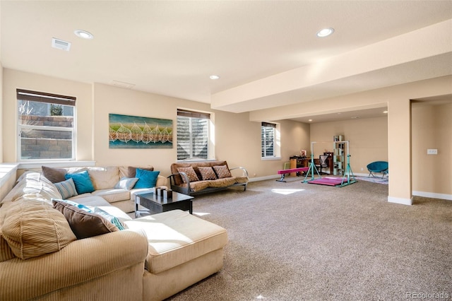 living room featuring recessed lighting, carpet, visible vents, and baseboards