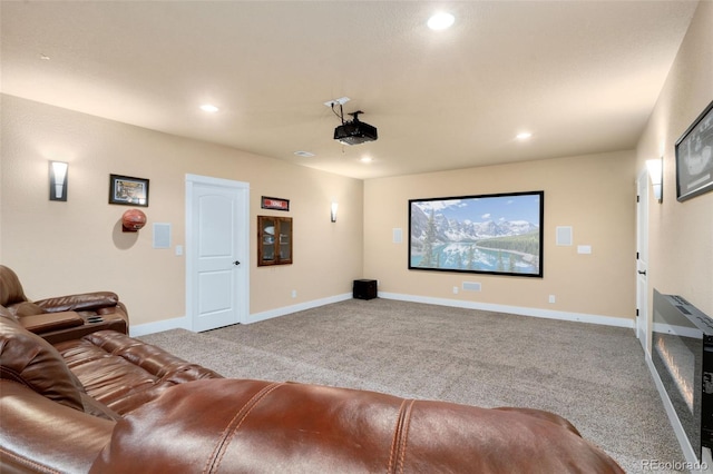 home theater featuring recessed lighting, baseboards, and carpet floors