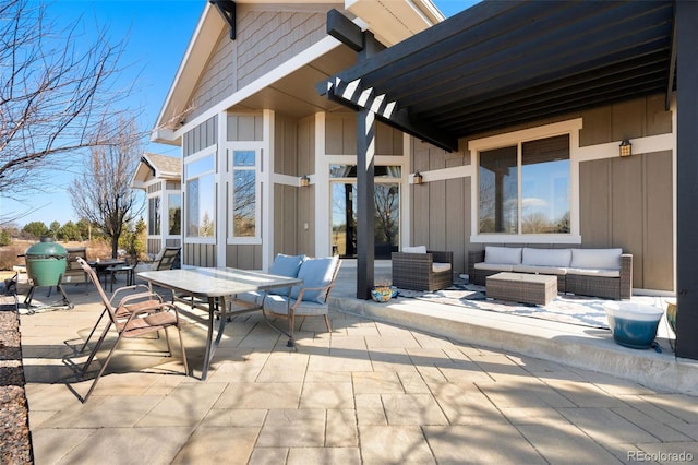 view of patio with outdoor dining area and outdoor lounge area