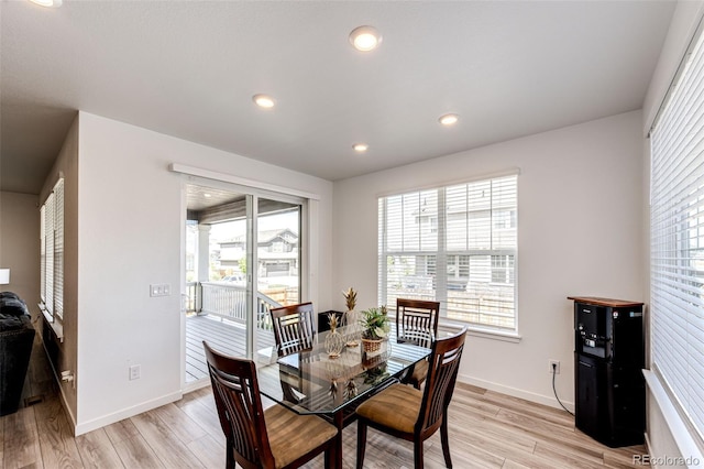 960 S De Gaulle Ct, Aurora, CO 80018 - dining space featuring light wood-style floors, plenty of natural light, baseboards, and recessed lighting