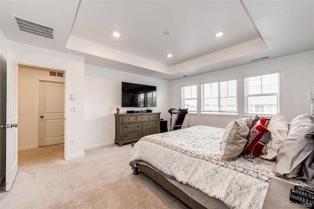 960 S De Gaulle Ct, Aurora, CO 80018 - bedroom featuring a tray ceiling, recessed lighting, light colored carpet, and baseboards