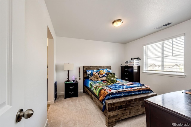 960 S De Gaulle Ct, Aurora, CO 80018 - bedroom featuring light carpet and baseboards