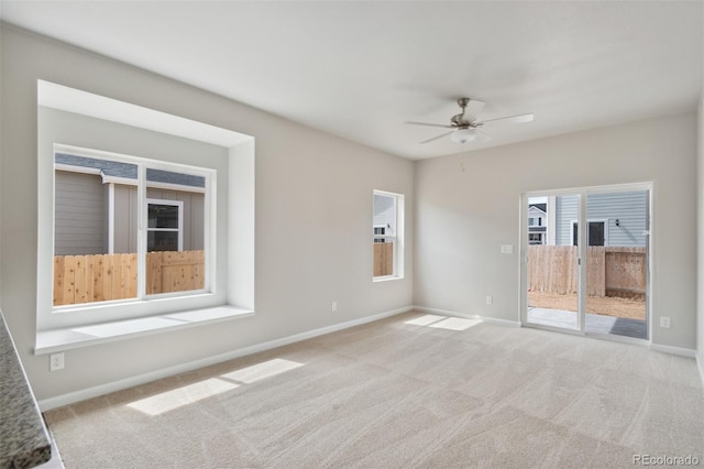 857 Sawdust Dr, Brighton, CO 80601 - spare room featuring carpet flooring, baseboards, and ceiling fan