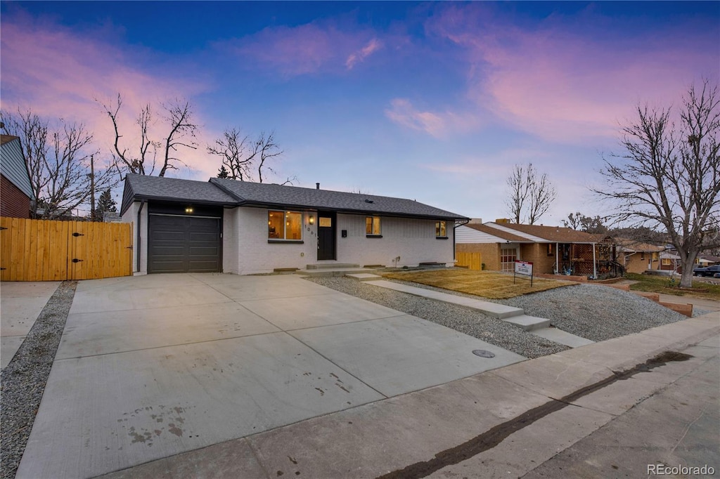 single story home featuring a garage