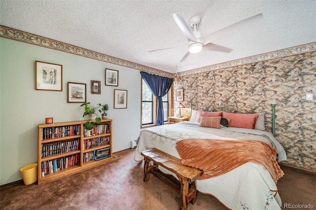 7815 Armadillo Trl, Evergreen, CO 80439 - carpeted bedroom with a baseboard heating unit, a ceiling fan, and a textured ceiling