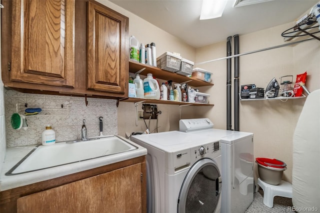 7815 Armadillo Trl, Evergreen, CO 80439 - washroom featuring cabinet space, independent washer and dryer, and a sink