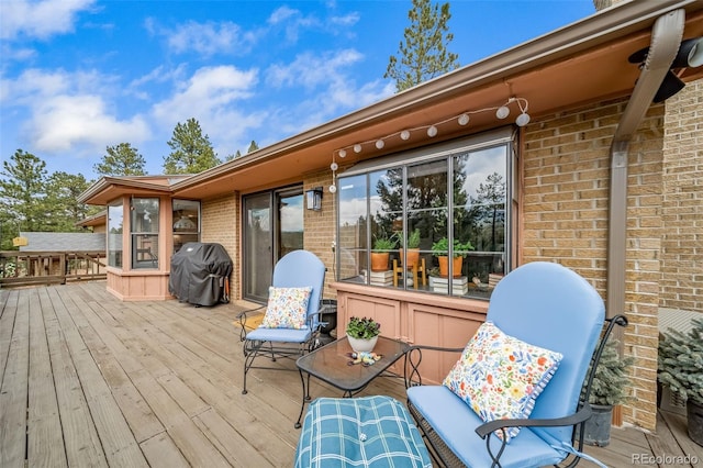 7815 Armadillo Trl, Evergreen, CO 80439 - wooden deck with area for grilling
