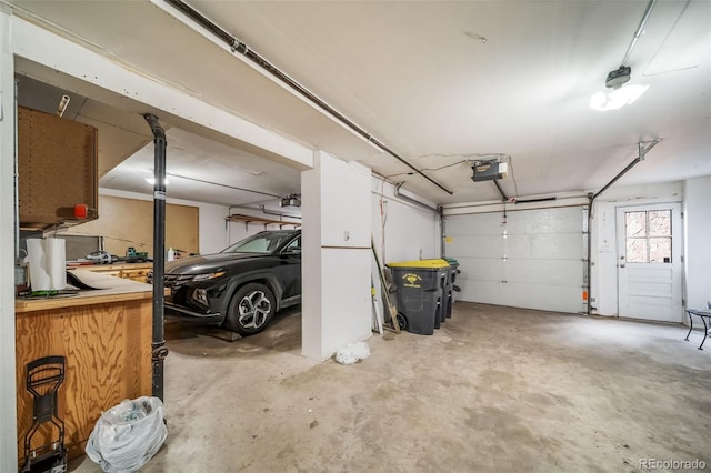 7815 Armadillo Trl, Evergreen, CO 80439 - garage featuring a garage door opener