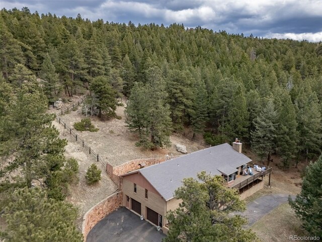 7815 Armadillo Trl, Evergreen, CO 80439 - aerial view featuring a forest view