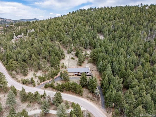 7815 Armadillo Trl, Evergreen, CO 80439 - birds eye view of property with a forest view and a mountain view