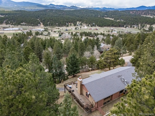 7815 Armadillo Trl, Evergreen, CO 80439 - birds eye view of property with a mountain view and a wooded view