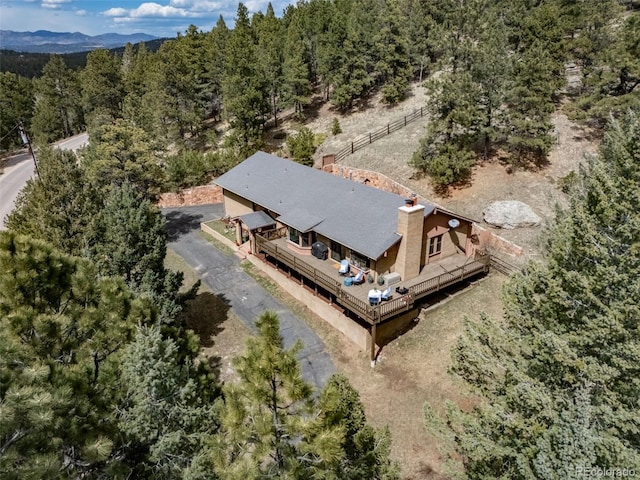 7815 Armadillo Trl, Evergreen, CO 80439 - birds eye view of property with a view of trees and a mountain view