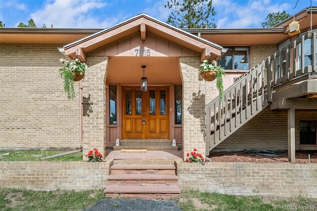 7815 Armadillo Trl, Evergreen, CO 80439 - property entrance with brick siding